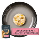Isolated aerial image of a plate of Encore chicken with salmon dog food jelly