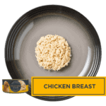 Isolated aerial image of a plate of Encore chicken in broth dog food