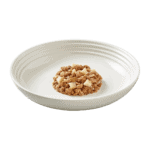 Isolated image of Encore Beef steak with potatos dog food in gravy on a plate
