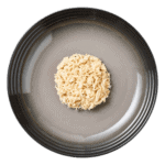 Isolated aerial image of a plate of Encore chicken cat food on a plate