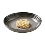 Isolated image of Encore chicken cat food with asparagus on a plate
