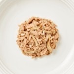 Close up aerial image of Encore cat food tuna and whitebait on a plate